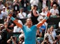 Rafael Nadal celebrates reaching the next round of the French Open on June 4, 2018