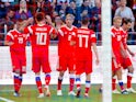 Russia's Aleksandr Samedov celebrates scoring their first goal with teammates during the World Cup warm-up friendly with Turkey on June 5, 2018