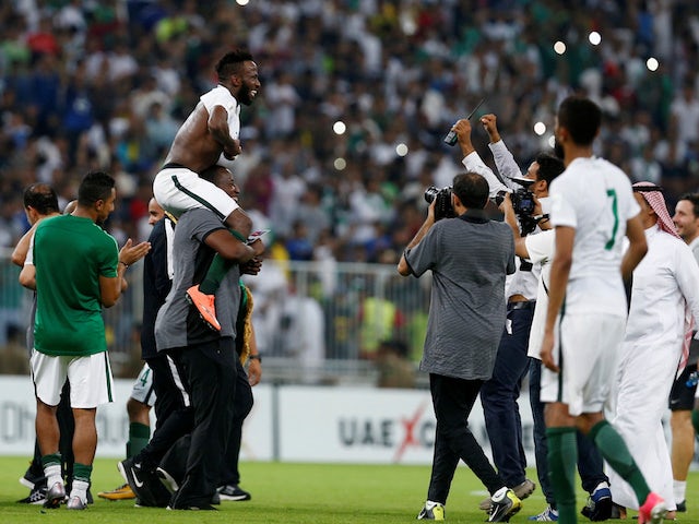 Saudi Arabia's players celebrate their qualification for the 2018 World Cup