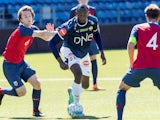 Jamaican sprint legend Usain Bolt and Norway's U19 player Fredrik Horn Myhre play in a friendly football match between Stromsgodset and Norway's U19 team at Marienlyst Stadium in Drammen, Norway, June 5, 2018.