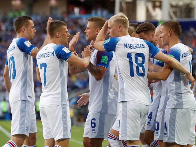 Alfred Finnbogason celebrates with teammates after equalising during the World Cup group game between Argentina and Iceland on June 16, 2018