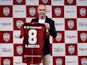 Andres Iniesta poses with the Vissel Kobe shirt after confirming his move to Japan on May 24, 2018