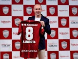 Andres Iniesta poses with the Vissel Kobe shirt after confirming his move to Japan on May 24, 2018