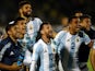 Lionel Messi celebrates with his Argentina teammates after clinching qualification for the 2018 World Cup