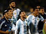 Lionel Messi celebrates with his Argentina teammates after clinching qualification for the 2018 World Cup
