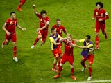 Belgium's players celebrate beating USA in the last 16 of the 2014 World Cup