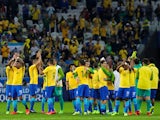 Brazil players celebrate after clinching qualification for the 2018 World Cup in Russia