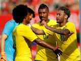 Neymar, Willian and Paulinho celebrate during Brazil's international friendly with Austria in June 2018
