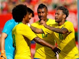 Neymar, Willian and Paulinho celebrate during Brazil's international friendly with Austria in June 2018