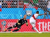 Christian Cueva misses a penalty past Kasper Schmeichel during the World Cup group game between Peru and Denmark on June 16, 2018