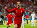 Cristiano Ronaldo scores from the spot during the World Cup group game between Portugal and Spain on June 15, 2018