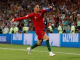 Cristiano Ronaldo grabs his third during the World Cup group game between Portugal and Spain on June 15, 2018