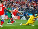 Denis Cheryshev scores the second during the World Cup opener between Russia and Saudi Arabia on June 14, 2018