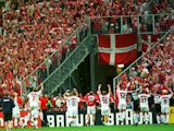 Denmark players celebrate reaching the quarter-finals at the 1998 World Cup