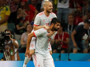 Costa registers as Spain overcome Iran