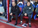 Manchester City assistant Domenec Torrent watches on with manager Pep Guardiola during a Premier League match in March 2018