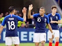 Nabil Fekir and Kylian Mbappe of France celebrate after scoring the opening goal of their international friendly with USA in June 2018