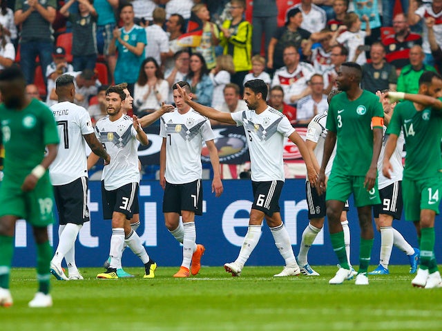 Germany's players celebrate after scoring during their World Cup warm-up match against Saudi Arabia on June 8, 2018