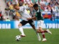 Germany's Joshua Kimmich in action with Mexico's Hirving Lozano on June 17, 2018