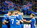 Iceland players celebrate during their international friendly with Norway on June 2, 2018