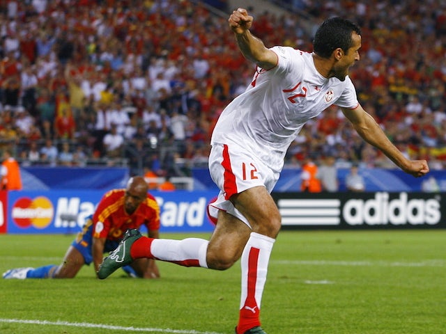 Jaouhar Mnari celebrates scoring the first goal for Tunisia against Spain at the 2006 World Cup