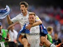 Lucas Piazon rides Tomas Kalas after Fulham secure promotion to the Premier League on May 26, 2018