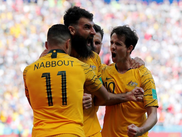 Mile Jedinak celebrates equalising from the spot during the World Cup group game between France and Australia on June 16, 2018
