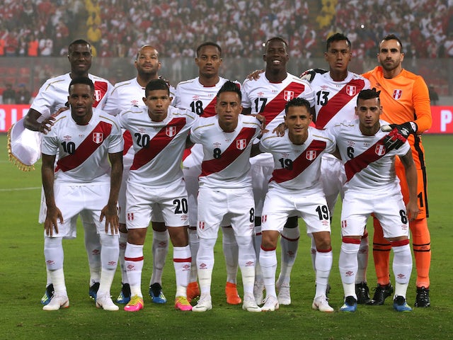 Peru line up before their international friendly with Scotland on May 30, 2018