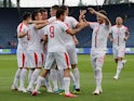 Serbia's players celebrate scoring in the international friendly against Bolivia on June 9, 2018