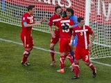 Serbia's players celebrate during their 2010 World Cup win over Germany
