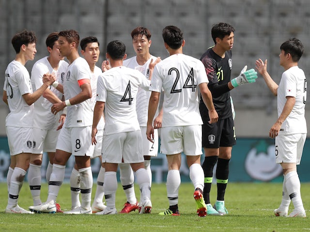 South Korea's players celebrate following their international friendly with Bolivia in June 2018
