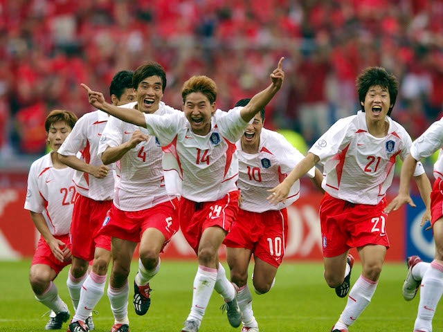 South Korea's players celebrate after beating Spain on penalties at the 2002 World Cup