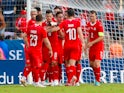 Switzerland's players celebrate a goal during their World Cup warm-up match against Japan on June 8, 2018