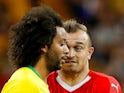 Switzerland's Xherdan Shaqiri reacts to Brazil's Marcelo during the World Cup match on June 17, 2018