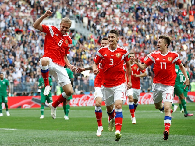 Yury Gazinsky scores the opener during the World Cup game between Russia and Saudi Arabia on June 14, 2018