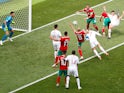 Portugal forward Cristiano Ronaldo scores the opening goal during his side's World Cup Group B clash against Morocco on June 20, 2018