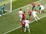 Portugal forward Cristiano Ronaldo scores the opening goal during his side's World Cup Group B clash against Morocco on June 20, 2018