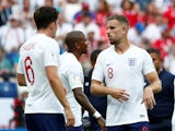 England's Jordan Henderson talks to Ashley Young and Harry Maguire during the match against Panama on June 24, 2018