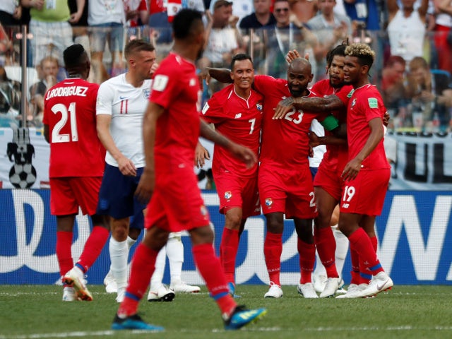 Panama's Felipe Baloy celebrates with teammates after scoring their first goal against England on June 24, 2018