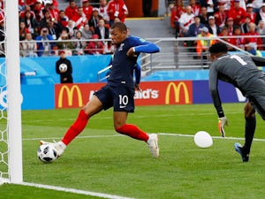 Kylian Mbappe scores the opener during the World Cup group game between France and Peru on June 21, 2018