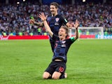 Croatia's Luka Modric celebrates with Sime Vrsaljko after scoring their second goal against Argentina on June 21, 2018