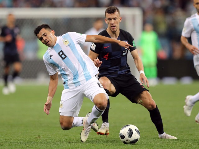 Argentina's Marcos Acuna in action with Croatia's Ivan Perisic on June 21, 2018