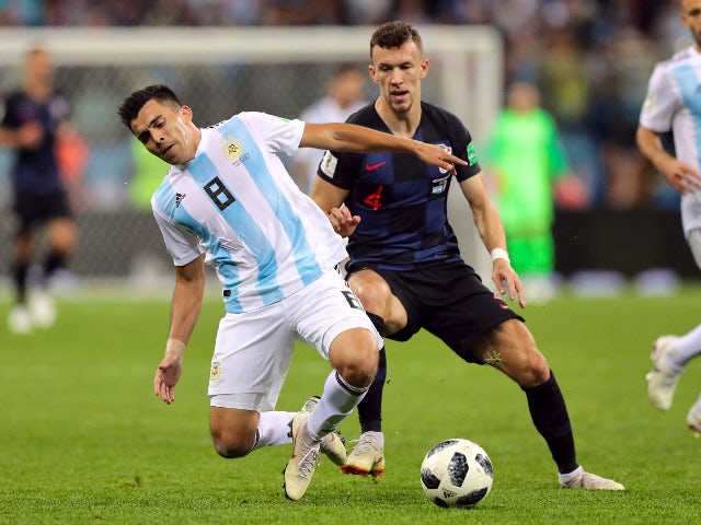 Argentina's Marcos Acuna in action with Croatia's Ivan Perisic on June 21, 2018