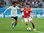 Egypt's Mohamed Salah in action with Russia's Yuri Zhirkov in the World Cup match on June 19, 2018