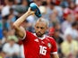 Morocco's Nordin Amrabat splashes water on himself during the match against Portugal on June 20, 2018