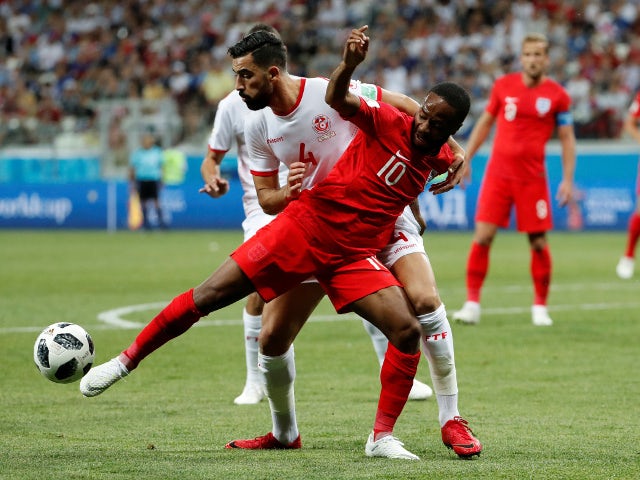 England's Raheem Sterling in action with Tunisia's Yassine Meriah on June 18, 2018