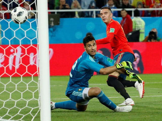 Spain's Iago Aspas scores their second goal against Morocco on June 25, 2018