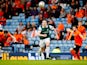 Hibernian's John McGinn in action with Dundee United's Paul Paton and Ryan Dow on April 16, 2016 