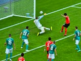 South Korea's Kim Young-gwon scores their first goal in the game against Germany on June 27, 2018