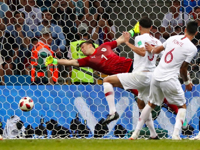 Portugal's Pepe scores their first goal against Uruguay on June 30, 2018